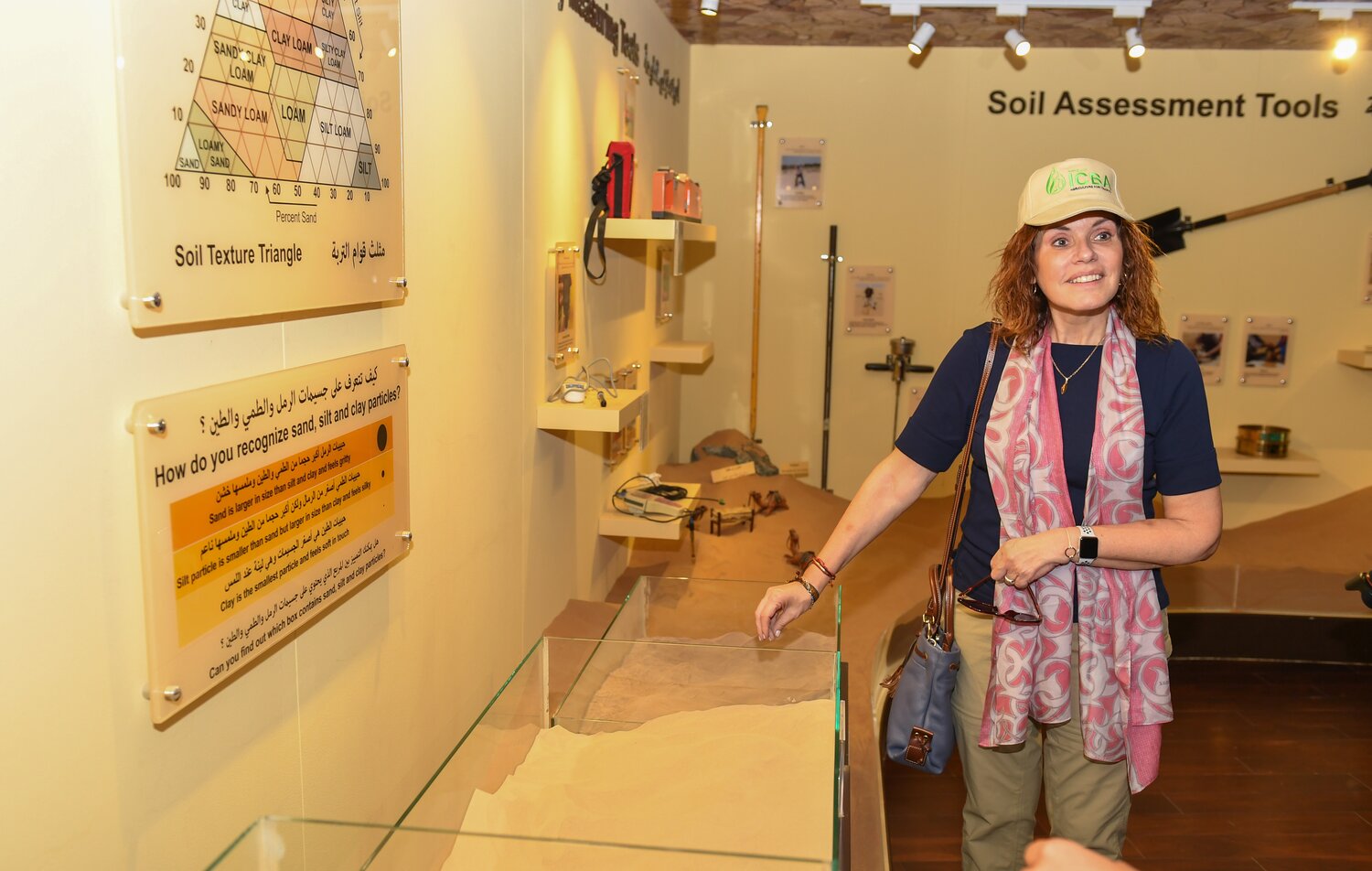 The Food Forever Chair, H.E. Mercedes Aráoz, testing the difference between gravel, silt and sand. Photo credit: ICBA