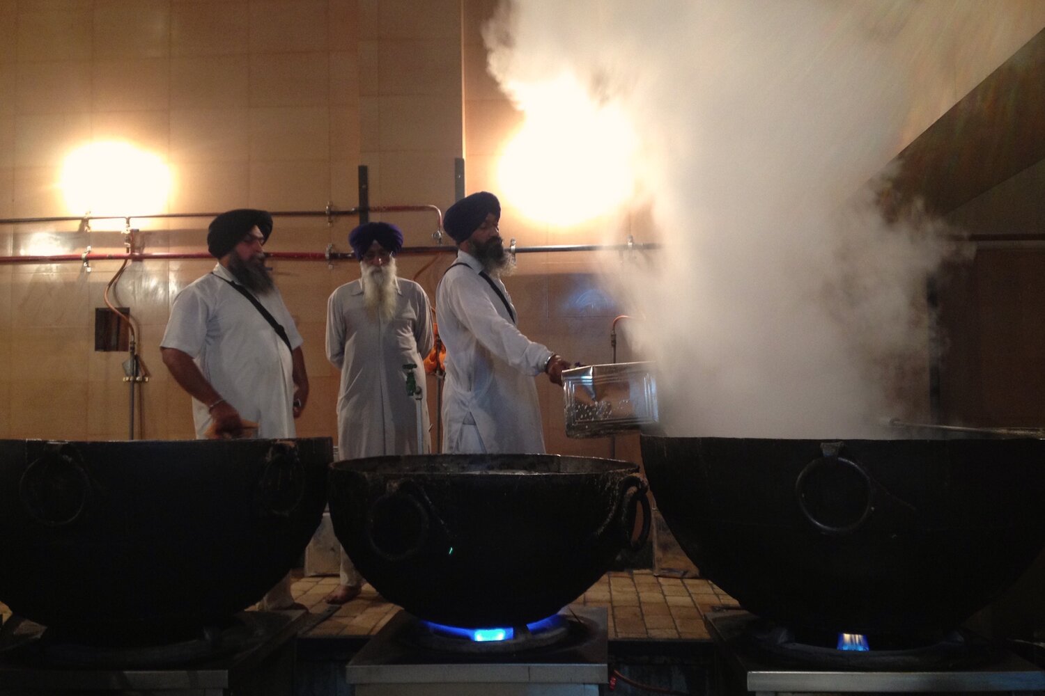 Halwais preparing Karah Prasad at the Golden Temple in Amritsar, India. Photo credit: Simran Sethi