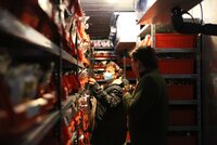 Marise Borja, one of the BOLD genebank reviewers, examines the INIAP long-term storage cold room. She is accompanied by Alvaro Monteros, the Delegate Manager at the National Department of Plant Genetic Resources in Ecuador