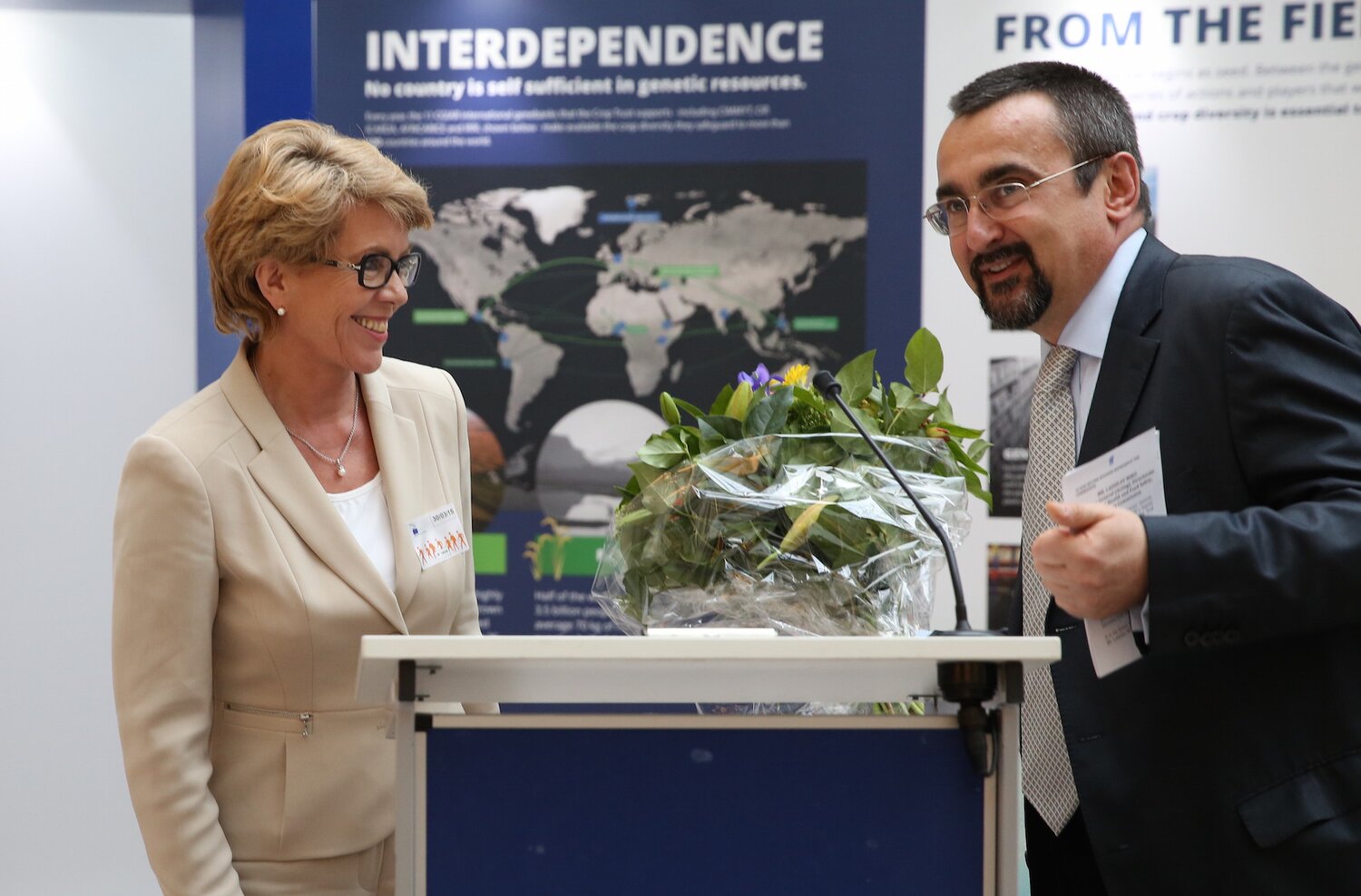 MEP Pavel Poc and Marie Haga share a laugh at opening of Crop Trust Exhibit in the European Parliament. 