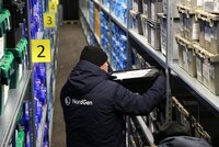 Person shelving container inside Svalbard Global Seed Vault