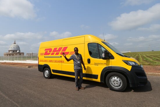 Following a quick check of the cargo near the Basilica of Our Lady of Peace in the capital Yamoussoukro, the journey to Mbe continues