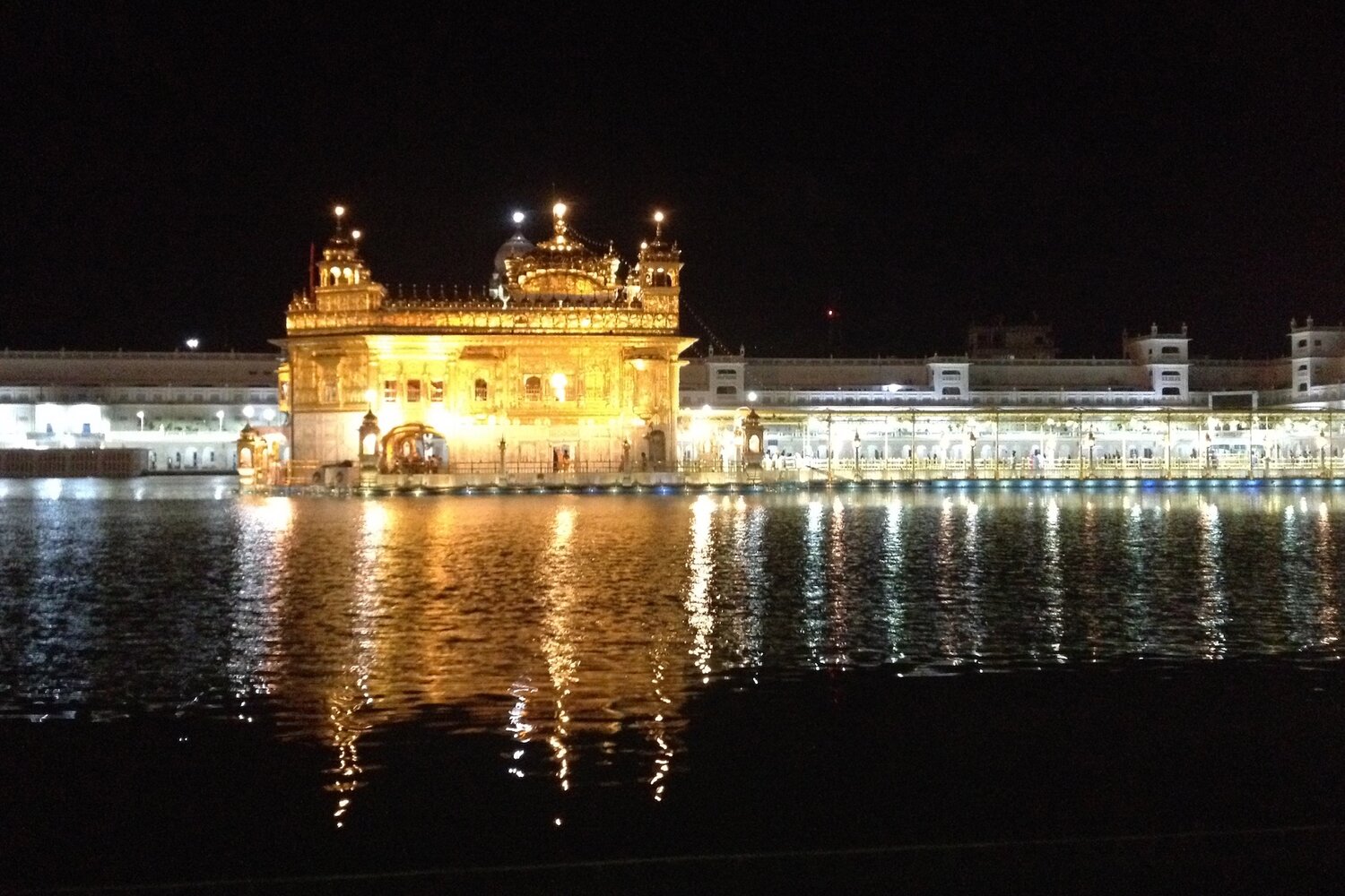 The Golden Temple during Karah Prasad preparation, Amritsar, India. Photo credit: Simran Sethi