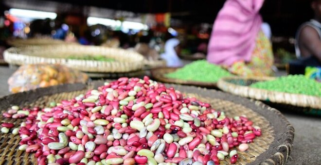 Beans in a pile on a basket.