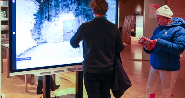 Visitors viewing virtual tour