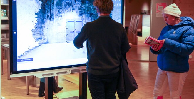 Visitors viewing virtual tour