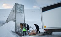 Seed boxes carried into Svalbard Global Seed Vault.