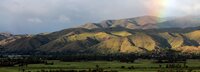 Mountain landscape with rainbow