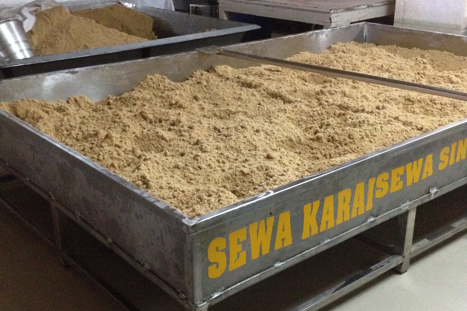 Donated wheat for Karah Prasad in the Golden Temple kitchen in Amritsar, India. Photo credit: Simran Sethi