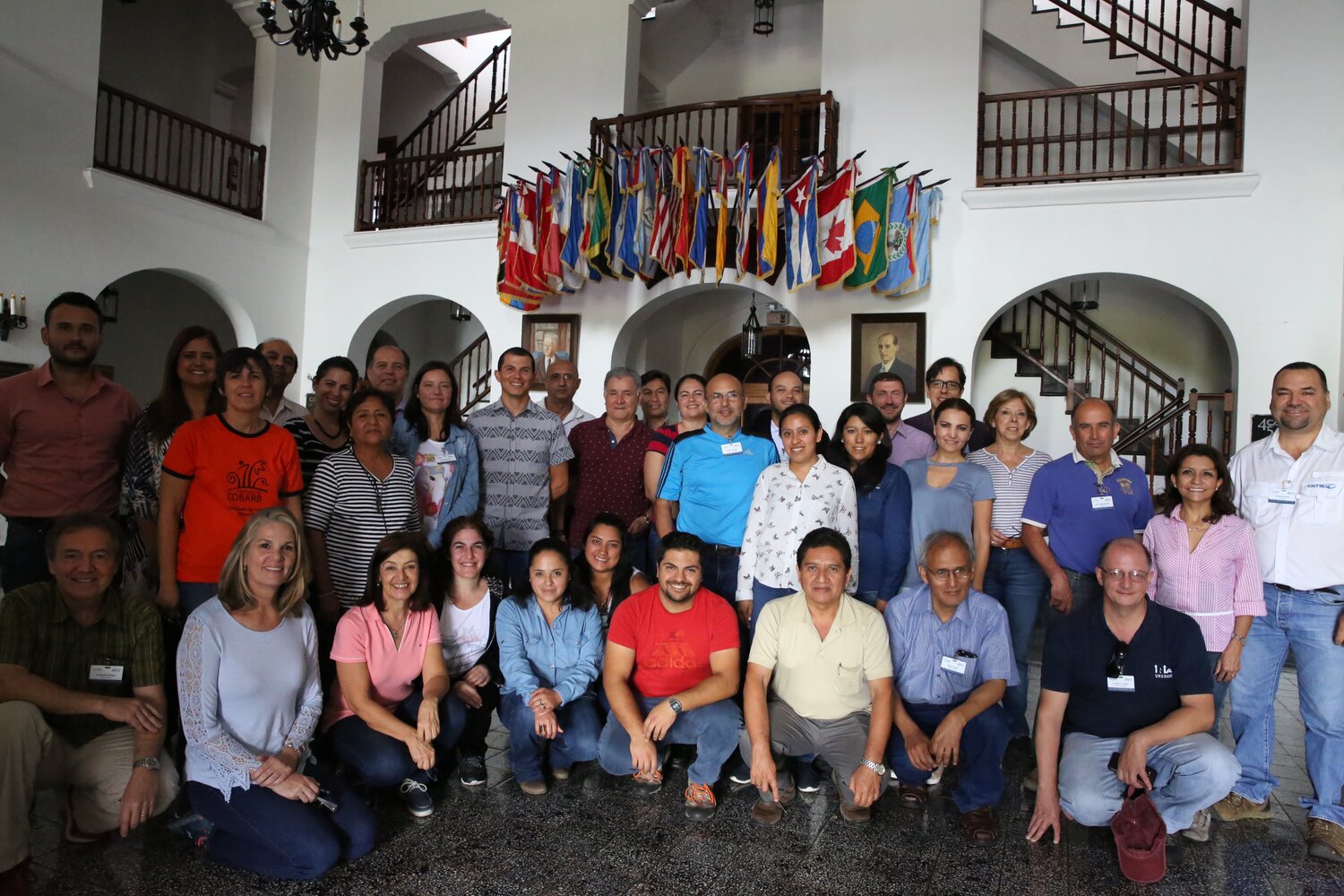 GOAL workshop participants pose for a group photo inside CATIE’s main building. 