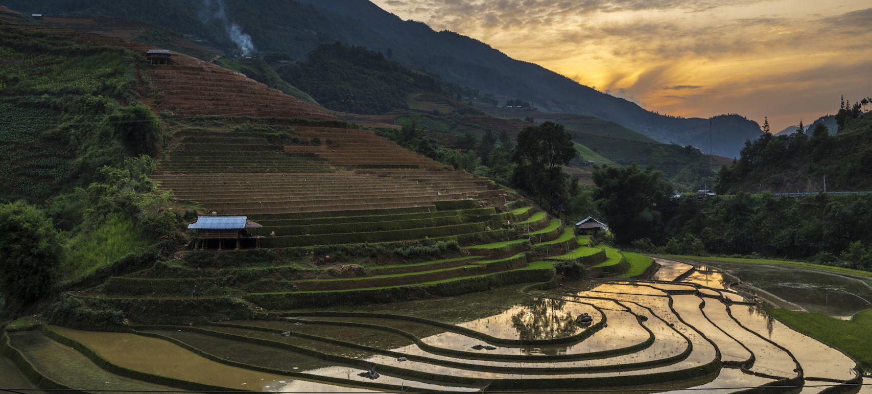 Terraced fields with mountains and sunset in Vietnam