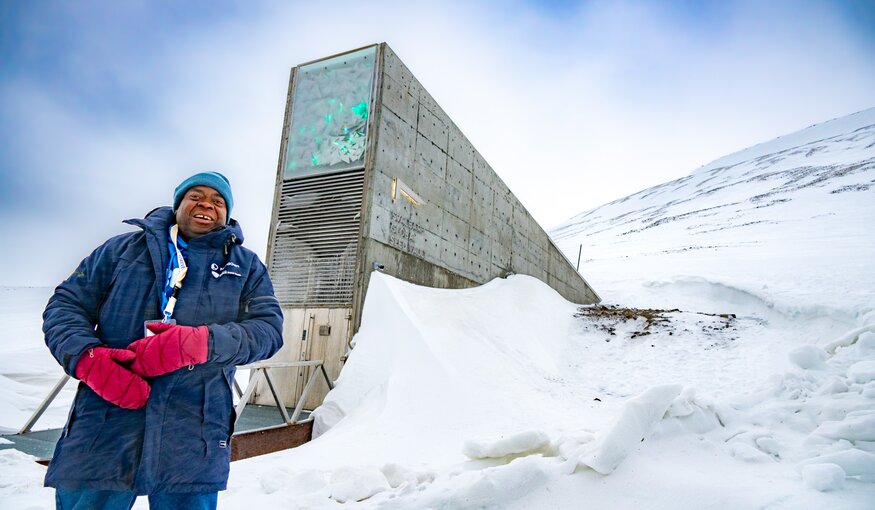 Patrick Kasasa of the Zimbabwe-based Community Technology Development Trust stands in front of the Svalbard Global Seed Vault after an emotional seed deposit ceremony. Photo: Mike Major/Crop Trust