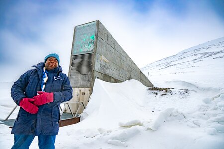Patrick Kasasa of the Zimbabwe-based Community Technology Development Trust stands in front of the Svalbard Global Seed Vault after an emotional seed deposit ceremony. Photo: Mike Major/Crop Trust