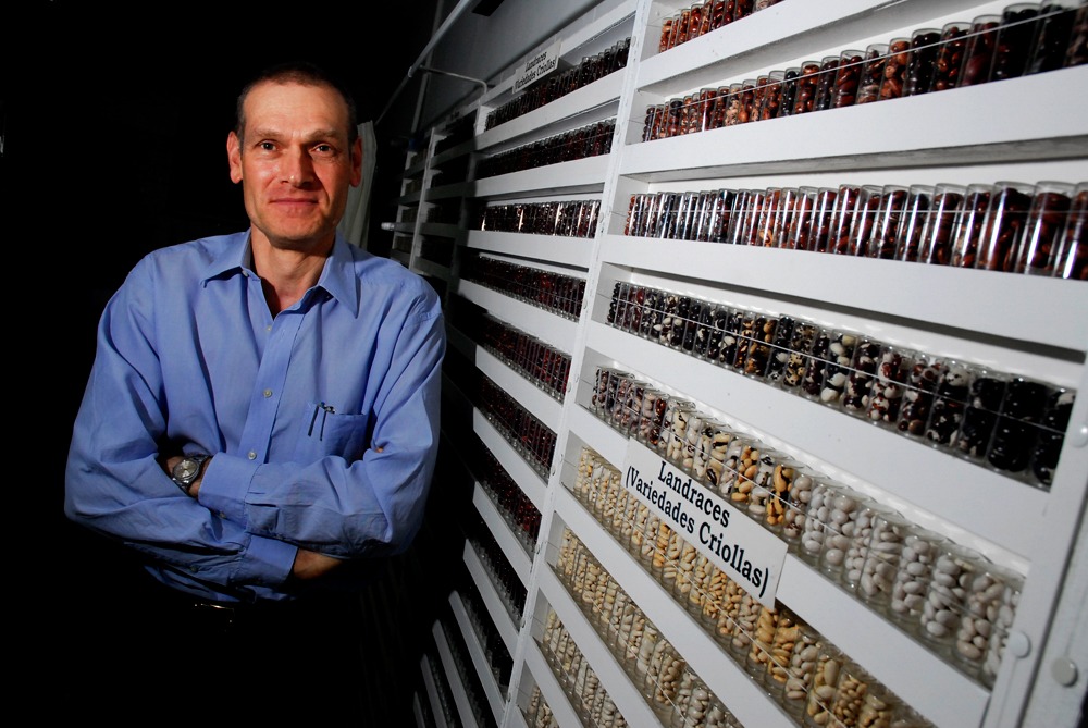 Dr. Debouck in front of CIAT genebank bean collection. 